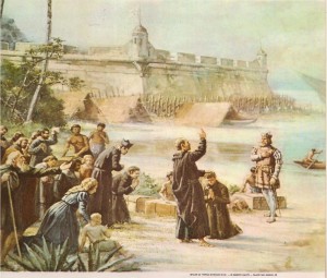 O Pe. Manuel da Nóbrega, abençoando as tropas lusas que, sob o comando de Estácio de Sá, partiam para expulsar os invasores franceses da Baía da Guanabara. A seus pés, ajoelhado, vemos o Pe. Anchieta.